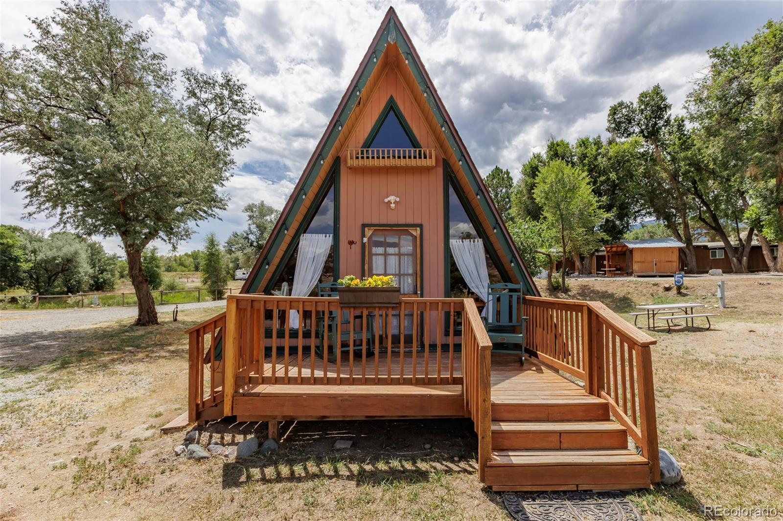 Rustic-chic cabin interior at Dark Sky River Lodge with mountain views