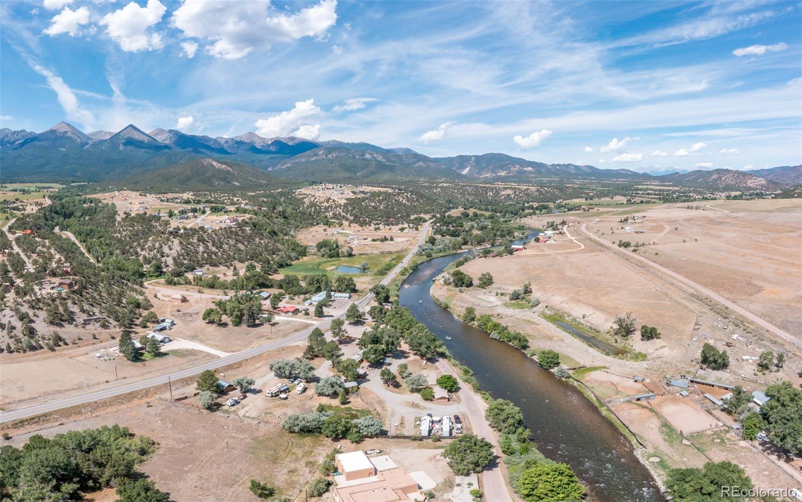 RV sites with full hookups surrounded by trees under starry Colorado skies