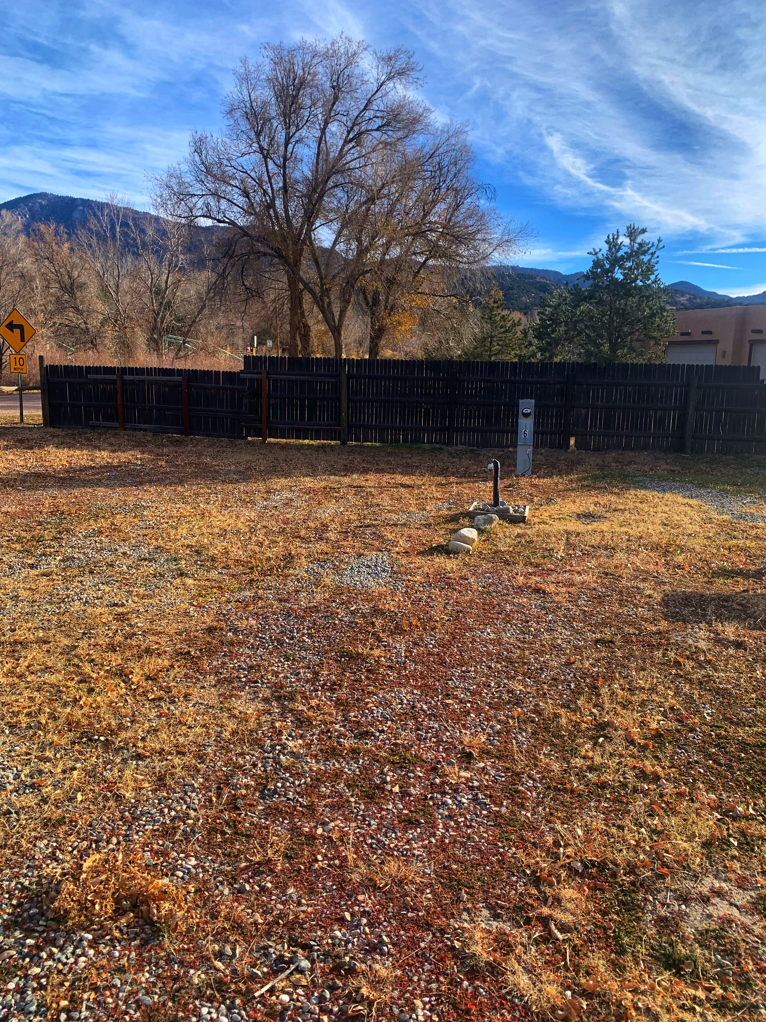 RV Site 6 in Lower River Zone surrounded by trees with privacy