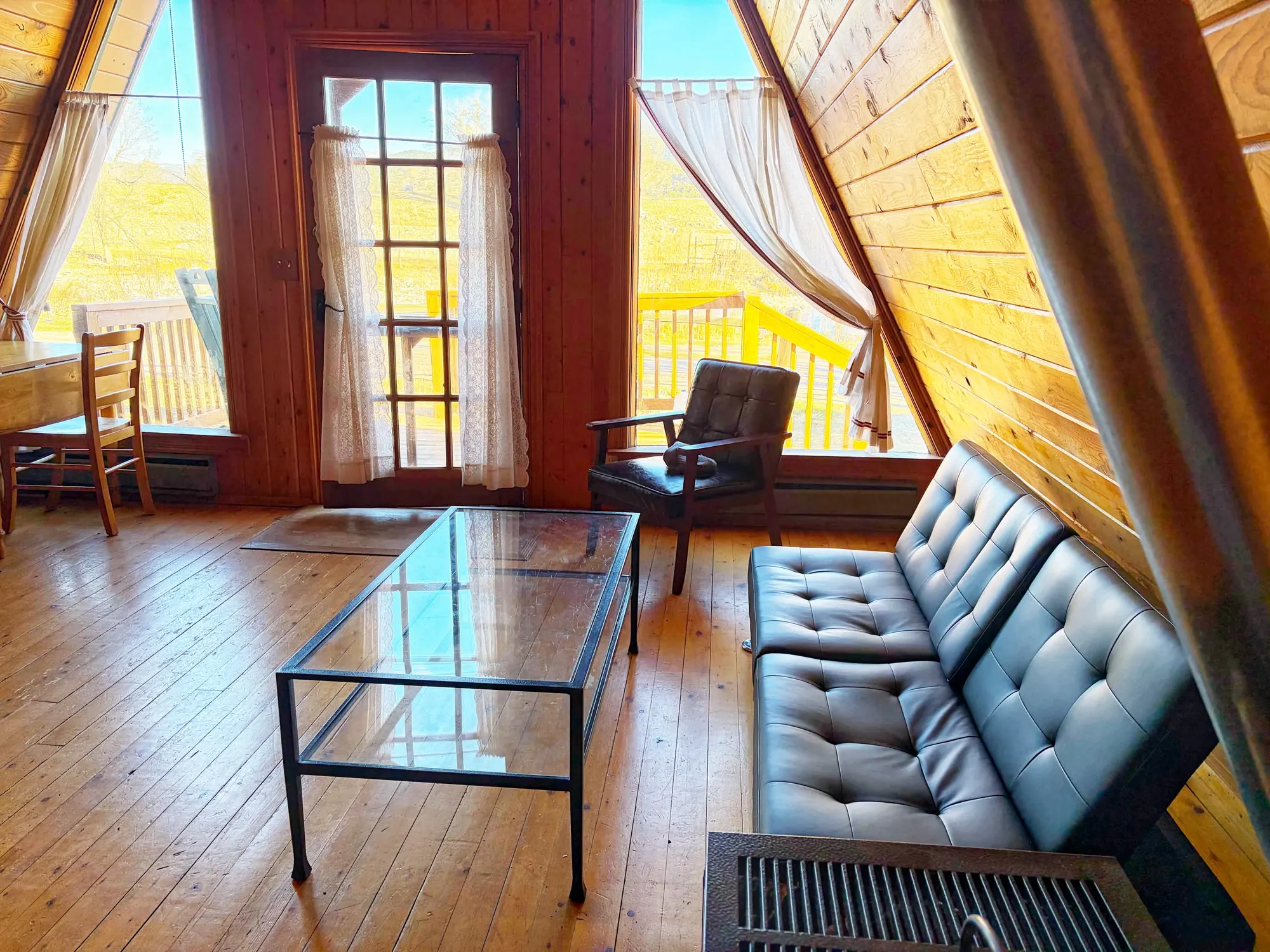 Wood-finished living area inside the A-Frame Cabin