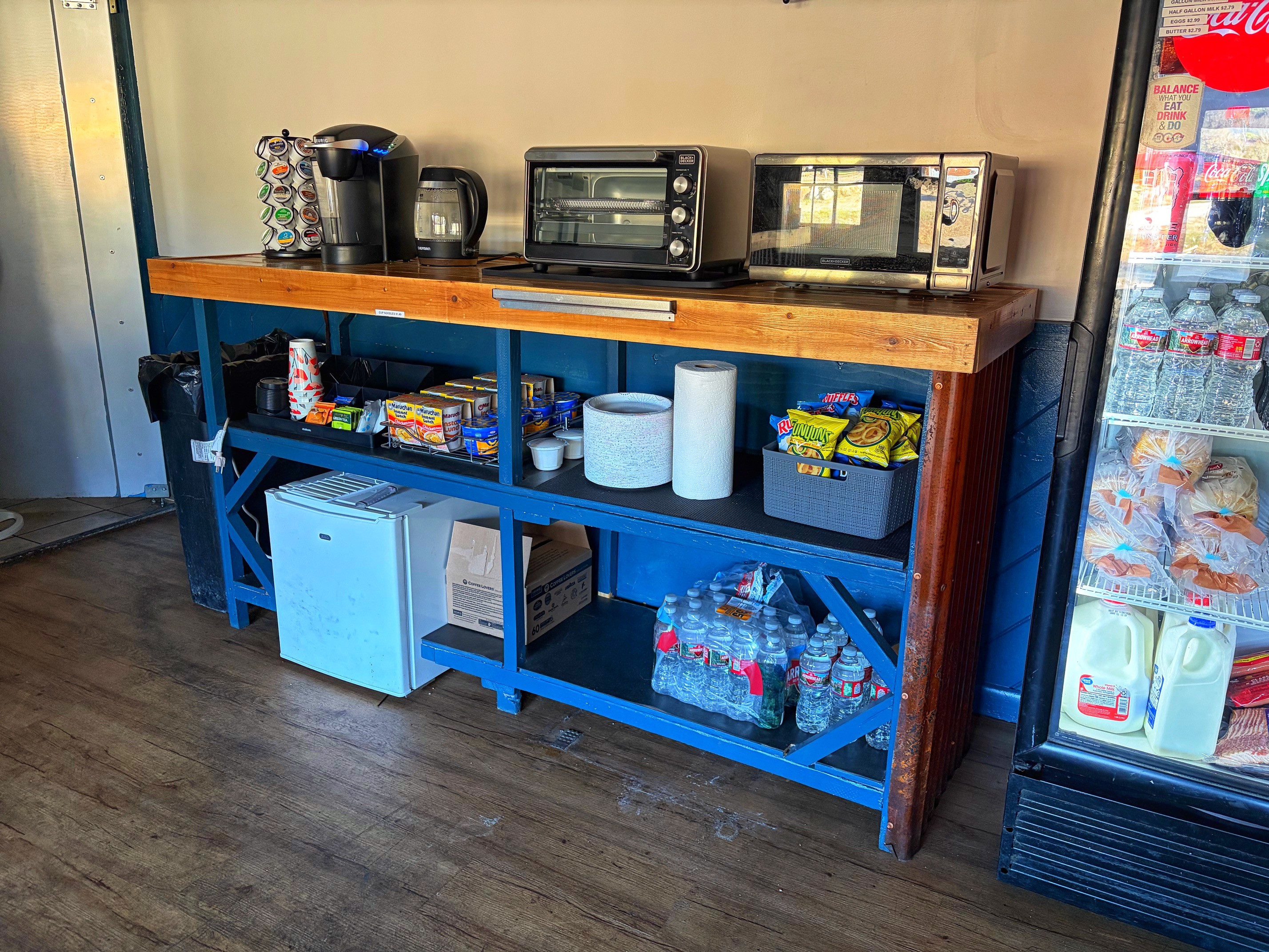 Self-serve counter stocked with camp and travel essentials