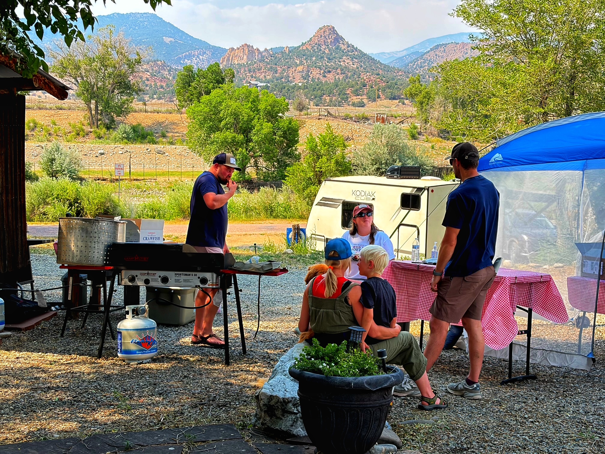 Guests relaxing together in an outdoor area at Dark Sky River Lodge